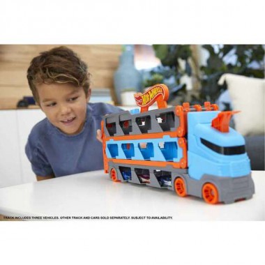 CAMION DE TRANSPORTE HOT WHEELS CONVERTIBLE EN PISTA DE COCHES.